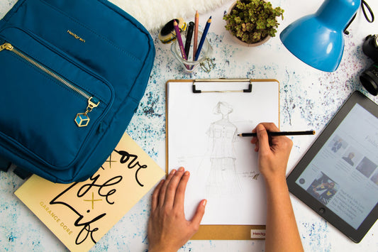 Fashion designer sketching
